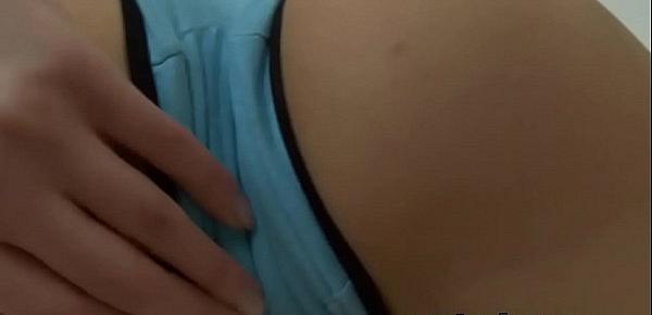  Adorable teenie strips seductively and uses a vibrator